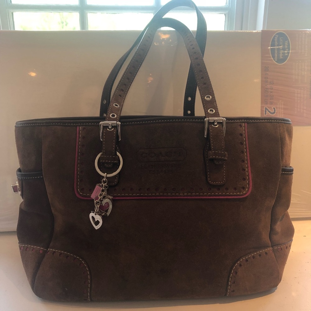 Coach handbag with charm